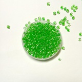 Стеклянный бисер 25г (крупный) прозрачный с цветным стержнем (зеленый) (Б032)