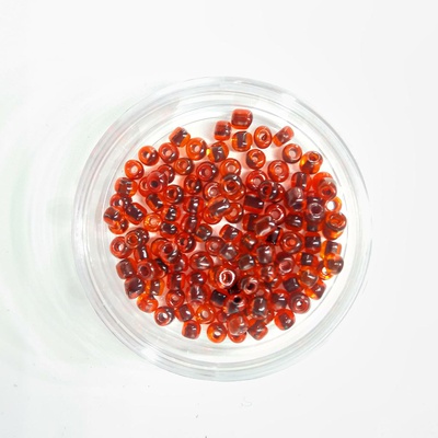 Стеклянный бисер 25г (крупный) прозрачный красный с цветным стержнем (черный) (Б042)